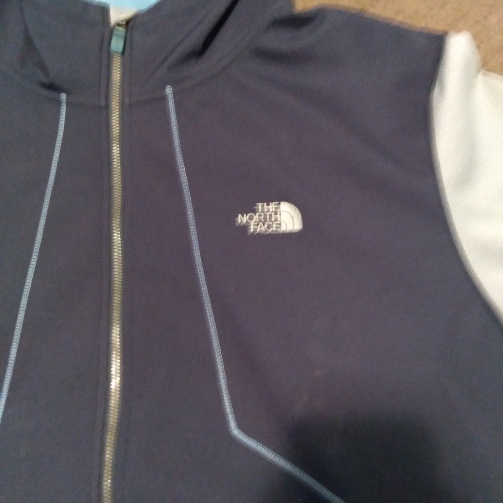 Multicolored north face zip-up coat